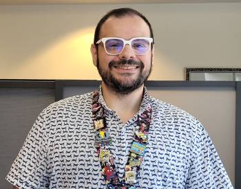smiling man in glasses