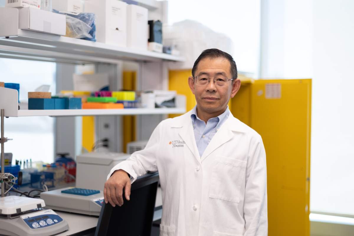 Photo of Zhiqiang An, PhD, in his lab.